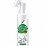 200 mL small white shoe cleaner bottle with a built-in brush applicator and green label on a white background